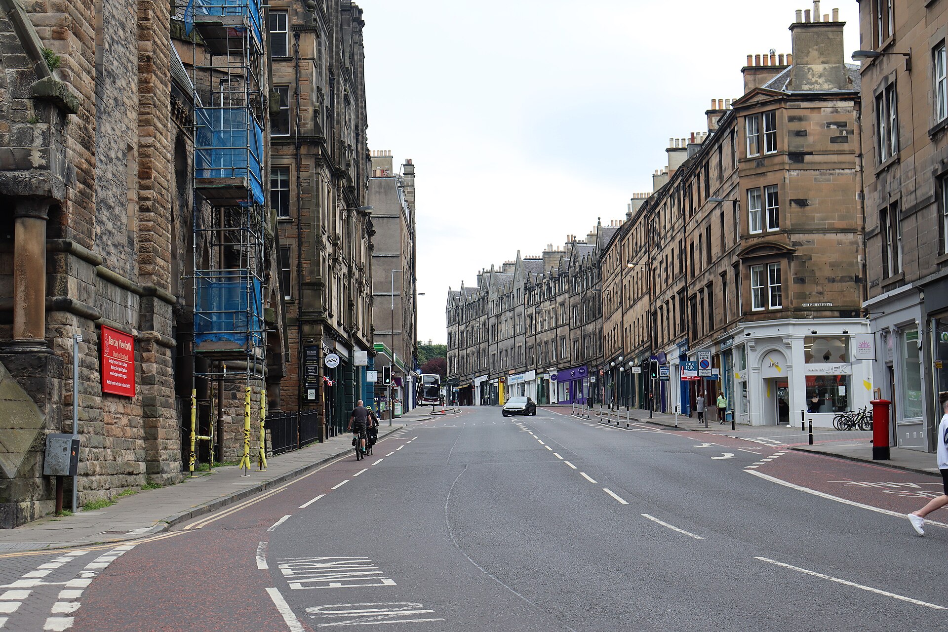Bruntsfield Place looking toward Gillespie Place, sandstone tenements and shopfronts beside Barclay Viewforth Church.